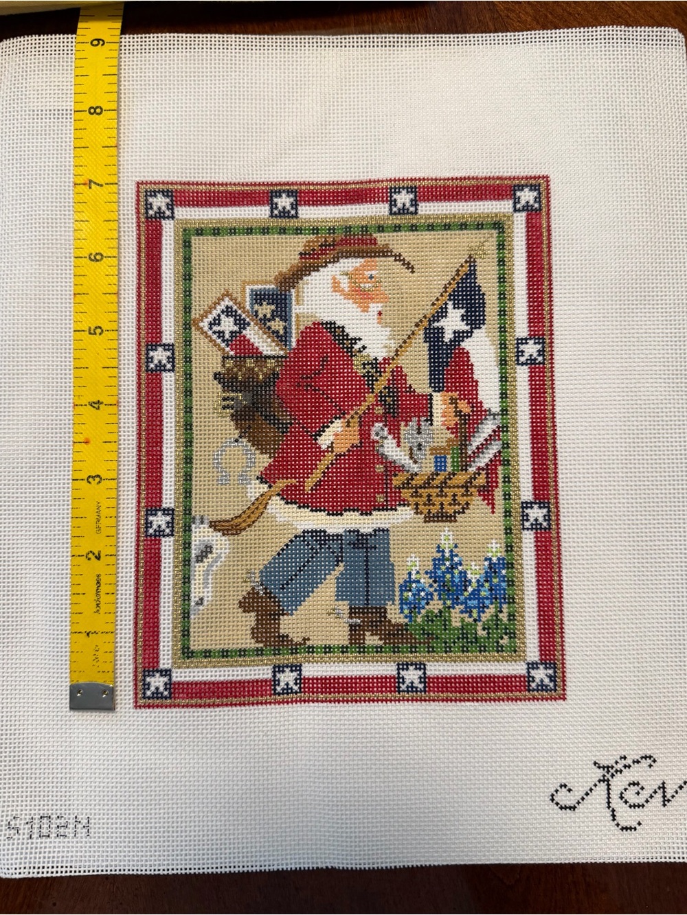 Texas Stitching Santa Needlepoint Canvas hand painted by Kelly Clark